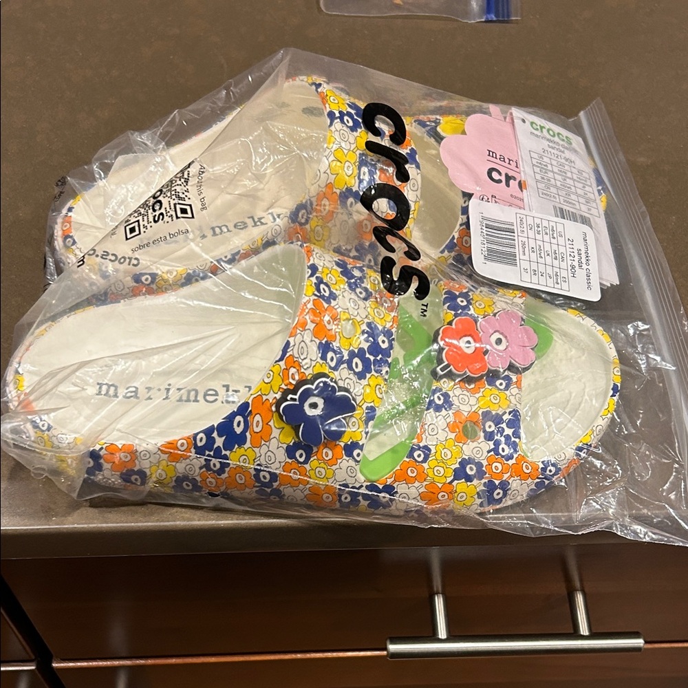 NWT CROCS X Marimekko Women’s Floral Sandals - Yellow, Blue, Orange on white
